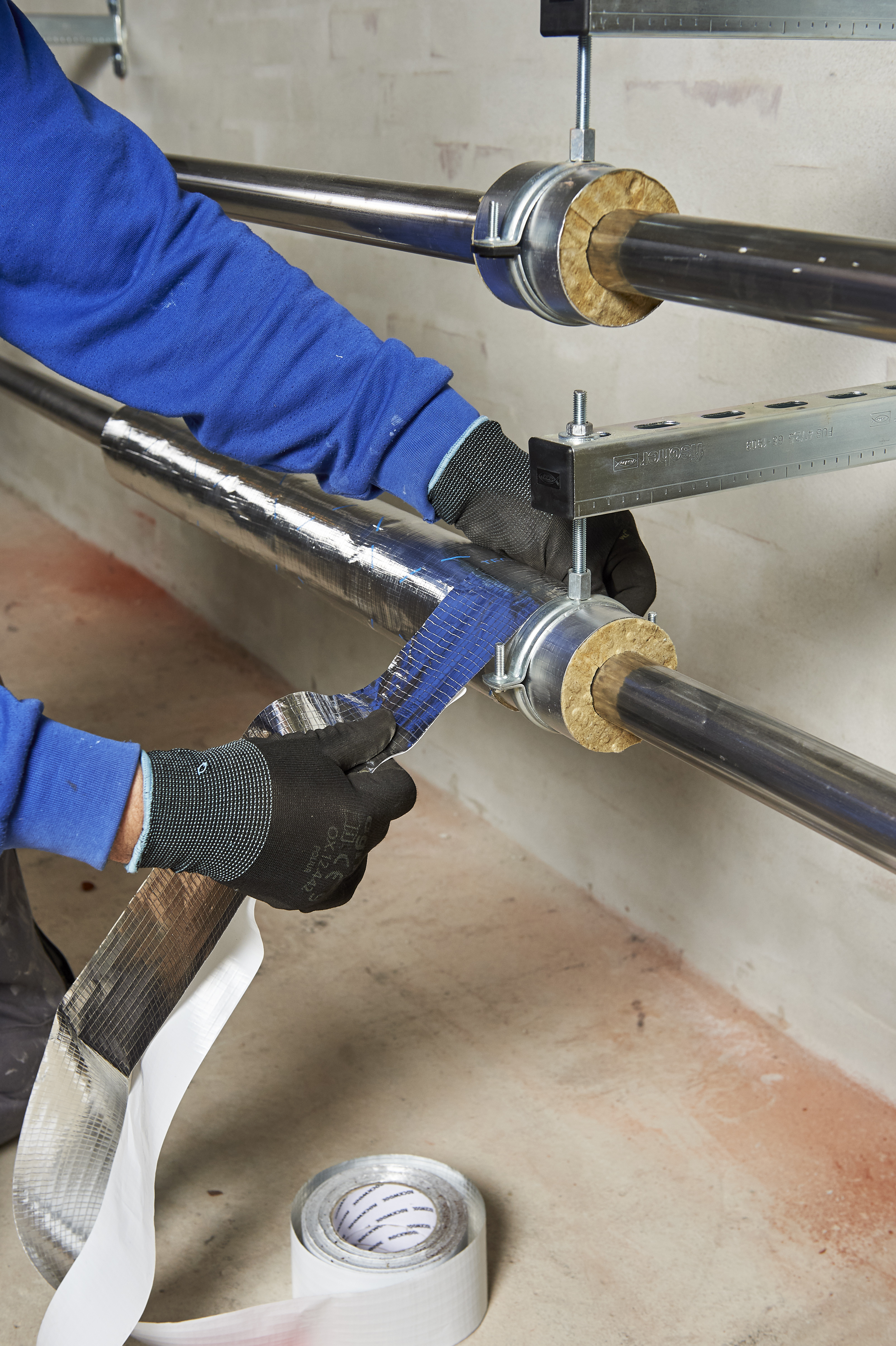 Reference case, TECLIT, Kolding Sygehus, Hospital, technical insulation, ITI, lamella mat, pipe section, case study, HVAC, cooling, Alu tape, flex tape, hanger